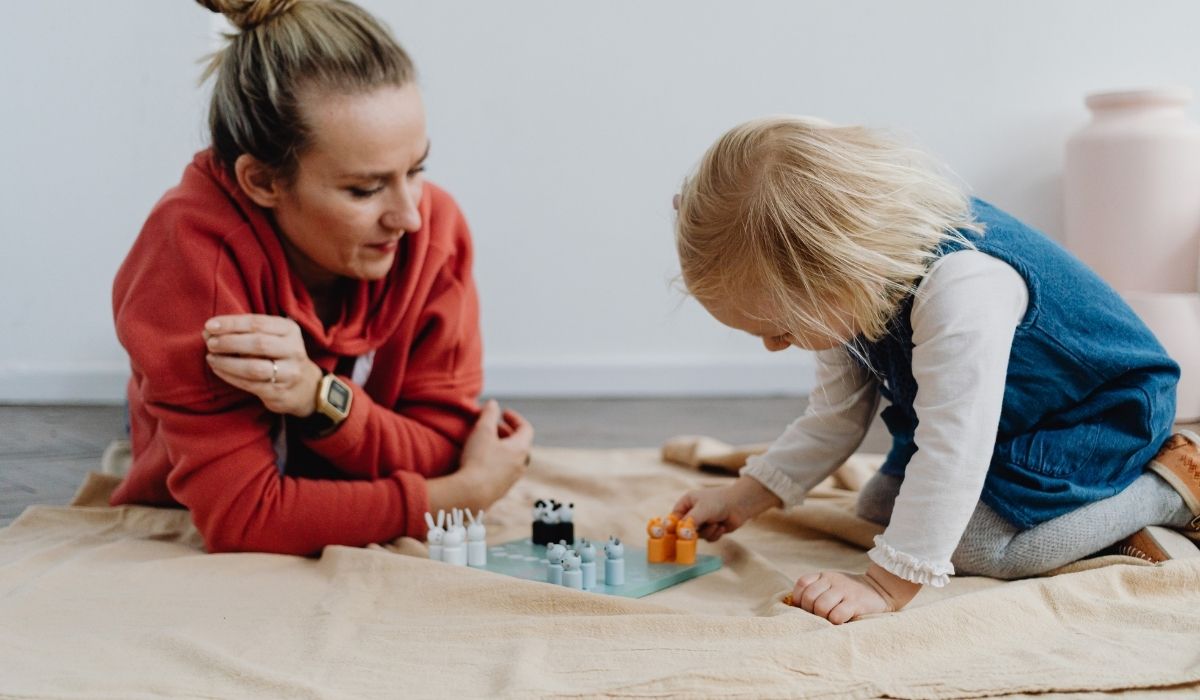 Parent supporting a child with autism at home